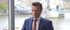 Ed swaps period costumes for slick suits in Papadopoulos & Sons